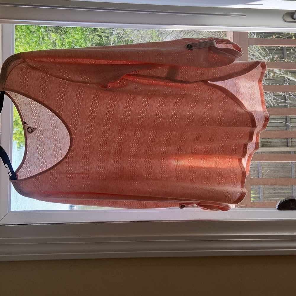 A peach three quarter length sleeve top